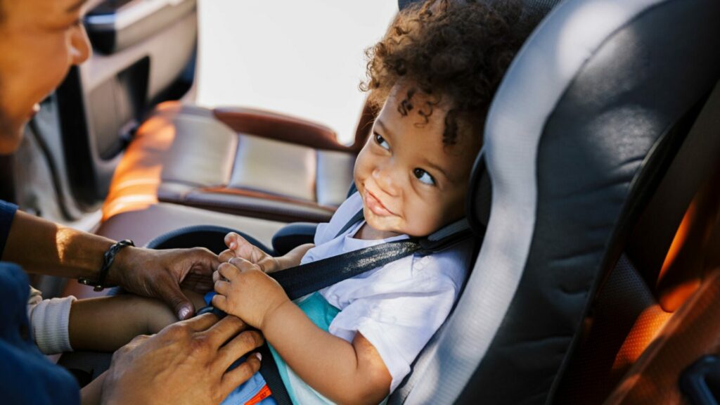 Parent Using Subaru ISOFIX to Strap Baby Seat